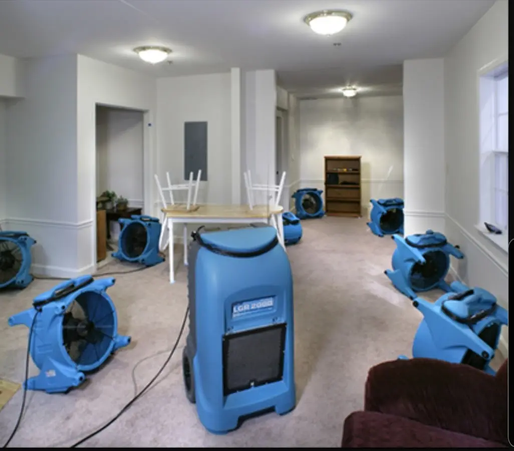 Air movers and dehumidifier setup for Water Damage Restoration in North Lakes
